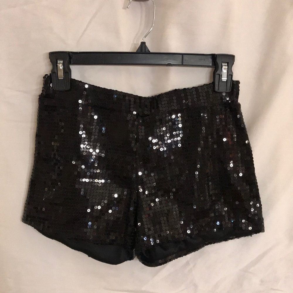 Sequin shorts. Elastic waistband. New without tag. Black. Size M.